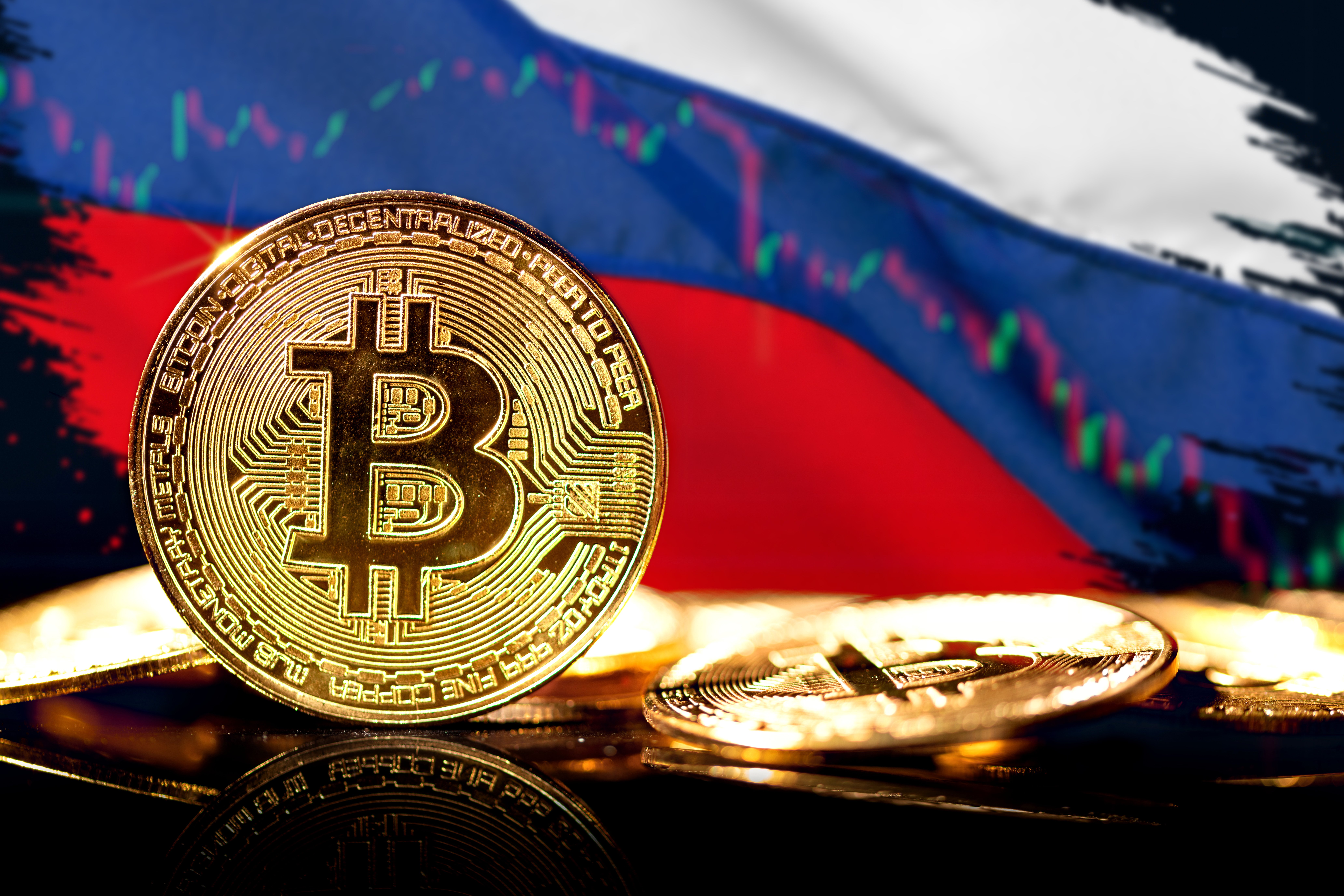 An artistic representations of a Bitcoin token, against a background of the Russian flag and a line chart.