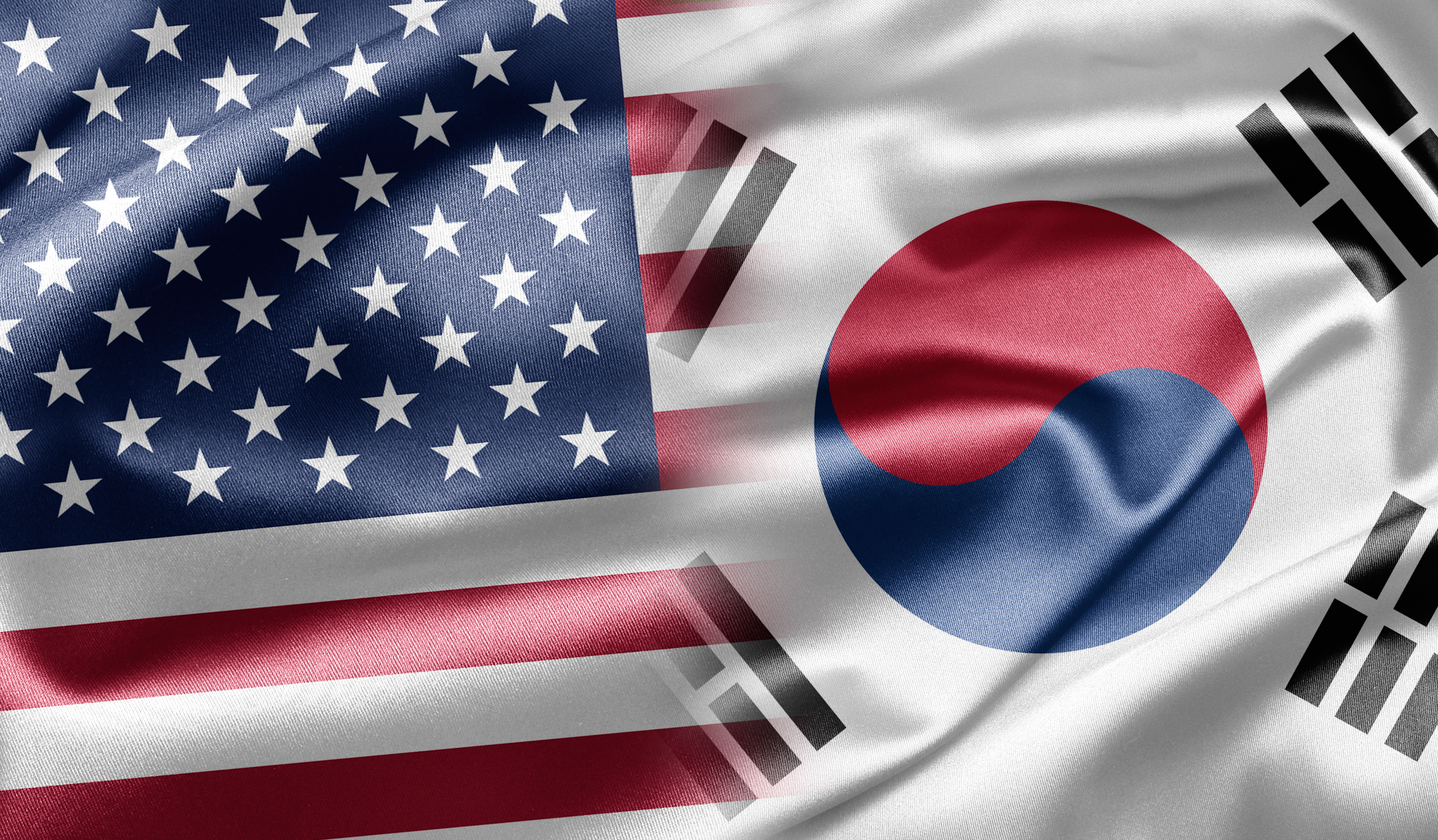 Flags of the United States of America and South Korea side by side.