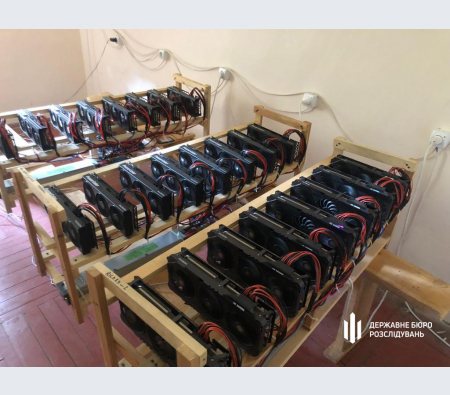 Banks of crypto mining rigs.